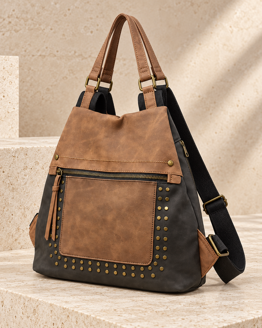 MOCHILA POLIPIEL TACHUELAS- NEGRA